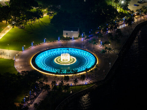 Downtown Miami fountain lit in blue