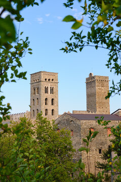 Sant Pere de Roda monastery bell tower framed by trees