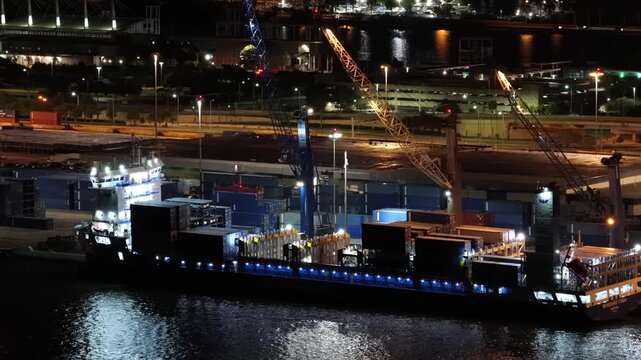 Stock video containers being loaded onto a cargo ship Port Miami