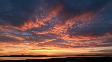 Fototapeta premium Calm Sunset Sky with Clouds at Dusk: Soft Gradient of Peach, Coral, and Lavender