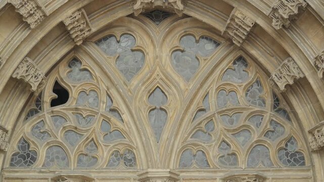 Detailed view of stone tracery on a gothic window of Oviedo Cathedral in Spain