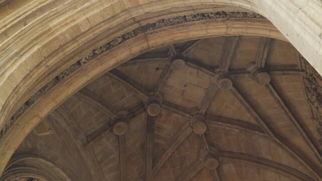 Low angle view of gothic stone ribbed vault ceiling in Oviedo Cathedral Spain