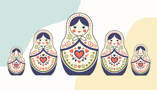 Series of five Russian matryoshka nesting dolls in varying sizes decorated with red hearts and traditional geometric patterns.