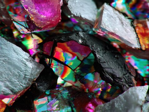 Macro view of iridescent mineral crystals and geological specimens