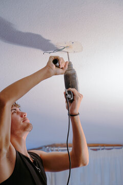 Home Repair at a Residence Using a Drill
