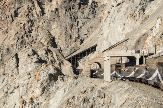 Canada, BC, Spences Bridge.  Sheds covering the railway tracks protecting them from snow and scree.  The Thompson River canyon.