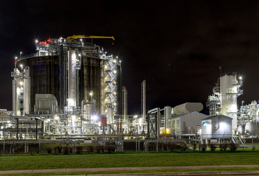 Canada, BC, Delta.  Liquified natural gas storage facility at night, Tilbury Industrial Park.