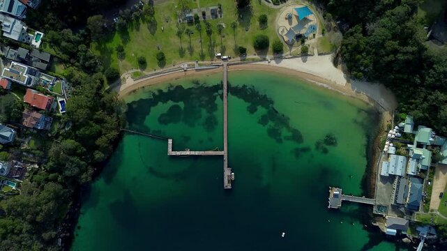 Top down aerial view of the coastline at Chowder Bay, Sydney Harbour, NSW, Australia