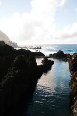 Natural volcanic rock pools by the Atlantic Ocean in Madeira, Portugal © Kuzma Sherbaniuk