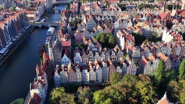 Aerial view of historic colorful buildings along the Motlawa River in the old town of Gdansk, Pomeranian Voivodeship, Poland.