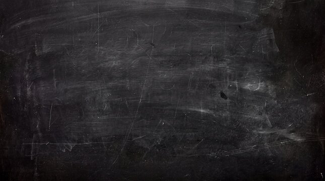 Chalkboard surface texture with white eraser marks and fine scratches on black background