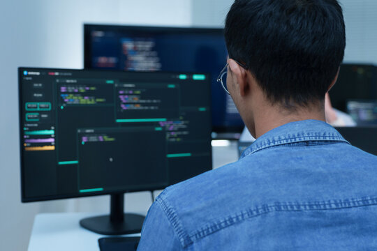 Programmer Developing Software Code and AI Applications