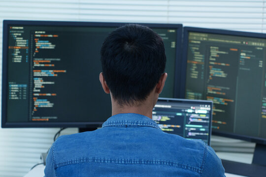 Programmer Developing Software with Code and Digital Technology