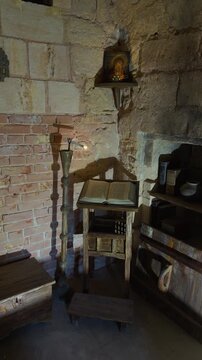 a medieval cell in which monks lived in churches and monasteries
