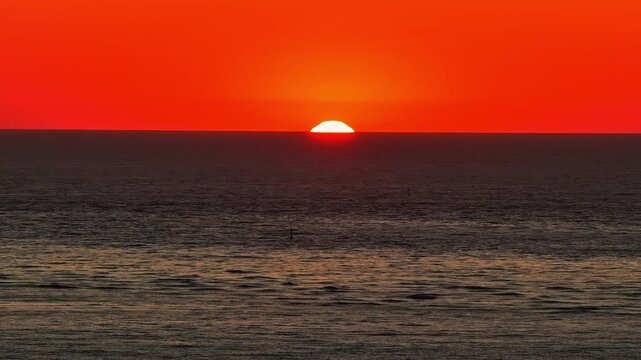 A Stunning Sunset Over the Ocean at Plage des Oc&eacute;anides, Capbreton, France - Wide Shot