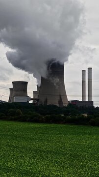 Massive smoke emission from RWE Power AG Niederau&szlig;em power plant, Germany.