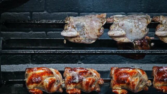 Rows of Authentic Peruvian Rotisserie Chicken Roasting on a Spit