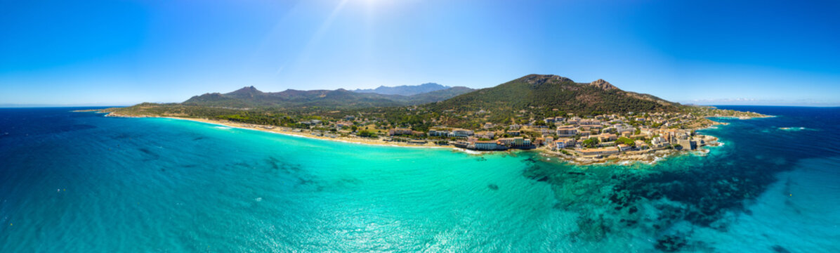 Algajola Corsica France aerial drone 14k panorama turquoise emerald sea beach waves resort town Balagne Ile Rousse region travel destination high resolution world print