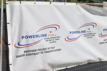 Fototapeta premium banner with sign for Powerline Plus, a utility contractor, (based in Scarborough), Toronto