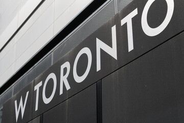 Fototapeta premium sign outside W Toronto, a four-star hotel, located at 90 Bloor St E