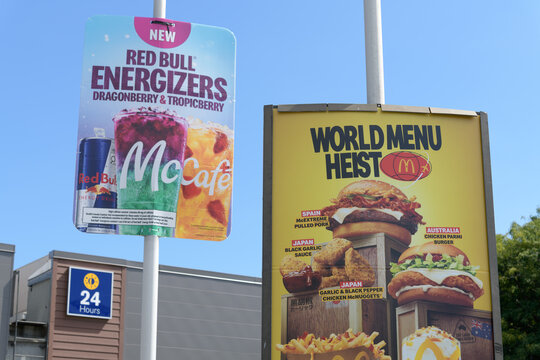 poster signs outside McDonald's Canada fast food restaurant chain located here at 1735 Danforth Avenue, Toronto
