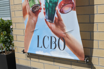 Fototapeta premium LCBO promotional banner outside a liquor shop in Toronto