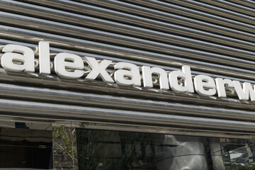 Fototapeta premium close-up of sign outside Alexander Wang fashion clothing store, located at 110 Bloor St W, Toronto