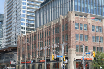 Obraz premium wide view of Loblaw Grocerteria headquarters and warehouse now the West Block development located at 500 Lake Shore Blvd W, northeast corner of Bathurst St, Toronto