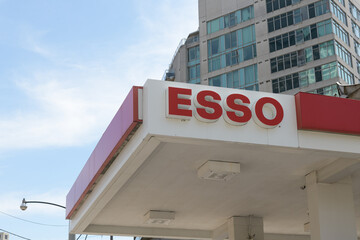 Obraz premium sign on canopy at Esso, a gas station, located at 553 Lake Shore Blvd W, Toronto