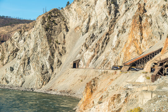 Canada, BC, Spences Bridge.  Sheds covering the railway tracks protecting them from snow and scree.  The Thompson River canyon.