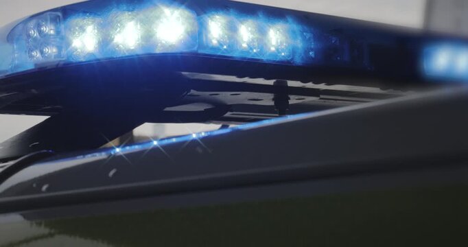 Emergency services flashing lights &ndash; police car at law enforcement crime scene, firefighter on call or light on paramedic ambulance at medical emergency.