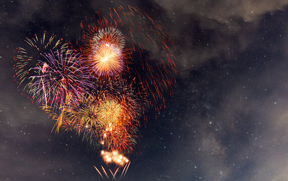Fireworks with blur milky way background