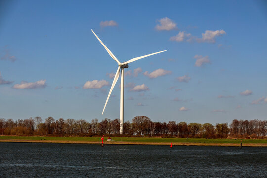 Windmills along the quay in the port of Rotterdam