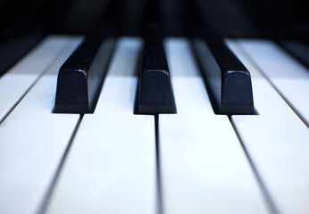 Piano keys on musical instrument creating harmony and rhythm © Cesar Gallardo