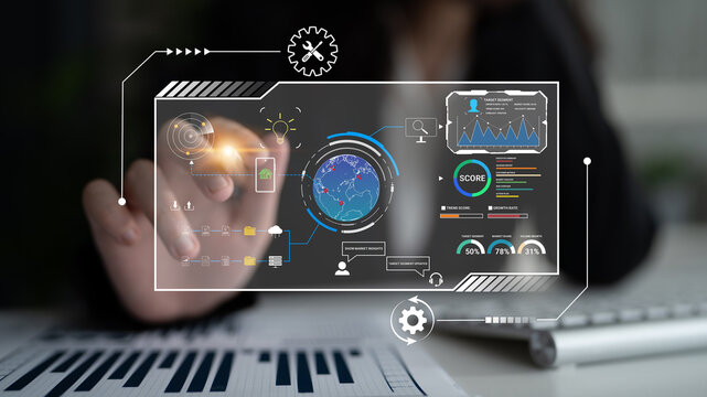 Business professional interacting with futuristic data visualization and analytics interface, touch holographic elements representing technology and information analysis in an office. Sentient.