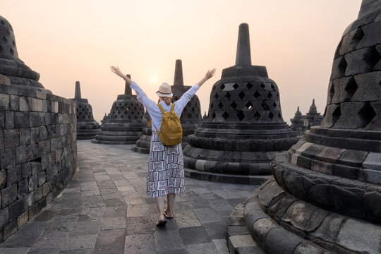 Tourist visiting Borobudur Temple at Yogyakarta Java Indonesia. Borobudur Temple is one of the most visited temple in Indonesia.