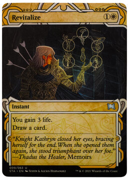 Hamburg, Germany - 09052026: Close-up photograph of the Magic: The Gathering Revitalize trading card from the Strixhaven Mystical Archive set, released in 2021.