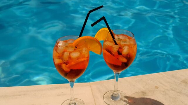 cocktails with aperol spritz and pool. selective focus.