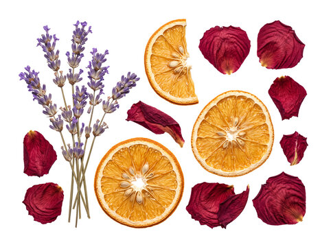 Dried orange slices lavender rose petals arranged on black background as organic botanical flat lay for spa aromatherapy wellness cosmetics branding design and natural organic lifestyle concept.