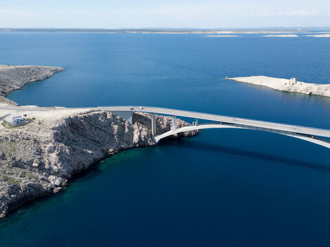 Aerial View of Pag Bridge and Rugged Coastline of Pag Island, Croatia