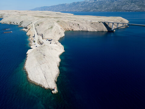 Aerial View of Pag Bridge and Rugged Coastline of Pag Island, Croatia