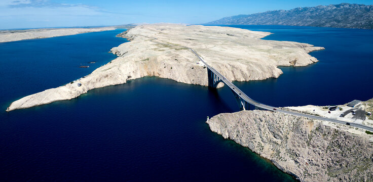 Aerial View of Pag Bridge and Rugged Coastline of Pag Island, Croatia