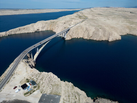 Aerial View of Pag Bridge and Rugged Coastline of Pag Island, Croatia