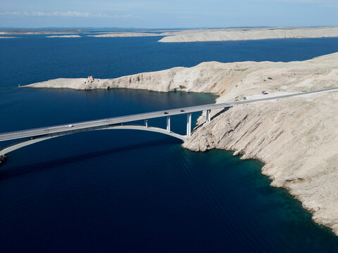 Aerial View of Pag Bridge and Rugged Coastline of Pag Island, Croatia