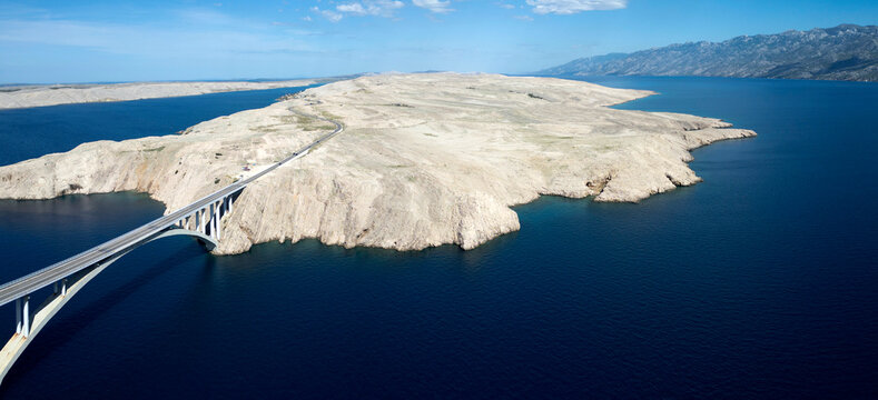 Aerial View of Pag Bridge and Rugged Coastline of Pag Island, Croatia