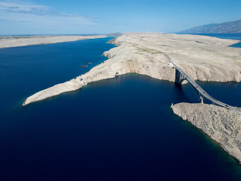 Aerial View of Pag Bridge and Rugged Coastline of Pag Island, Croatia