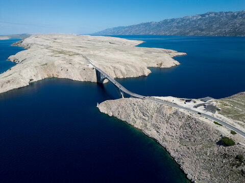 Aerial View of Pag Bridge and Rugged Coastline of Pag Island, Croatia