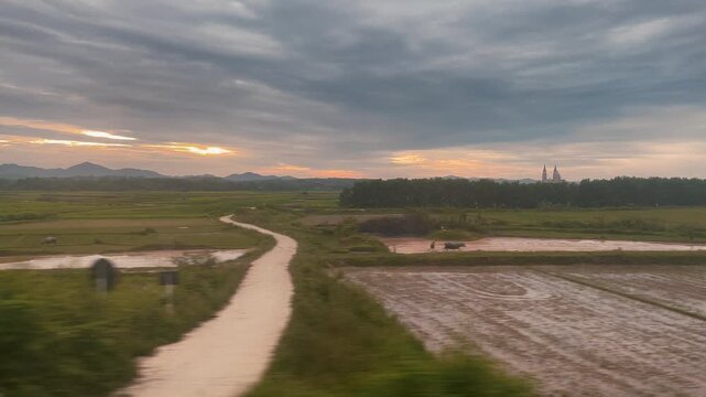 View of rural Vietnam country side from train car window