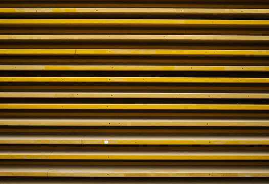 Minimalist architecture and geometric design, yellow wooden slats background with parallel lines and industrial texture for modern interior backdrop