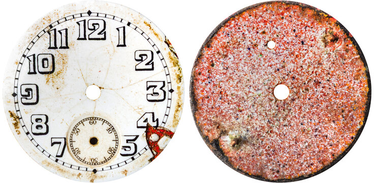 Isolated photo of white porcelain broken vintage worn clock or watch face on white background.